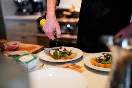 Enjoy breakfast and a lazy morning by the fire while others go cat-skiing